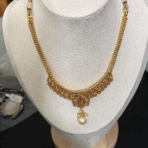 Gold and Pearl Statement Necklace